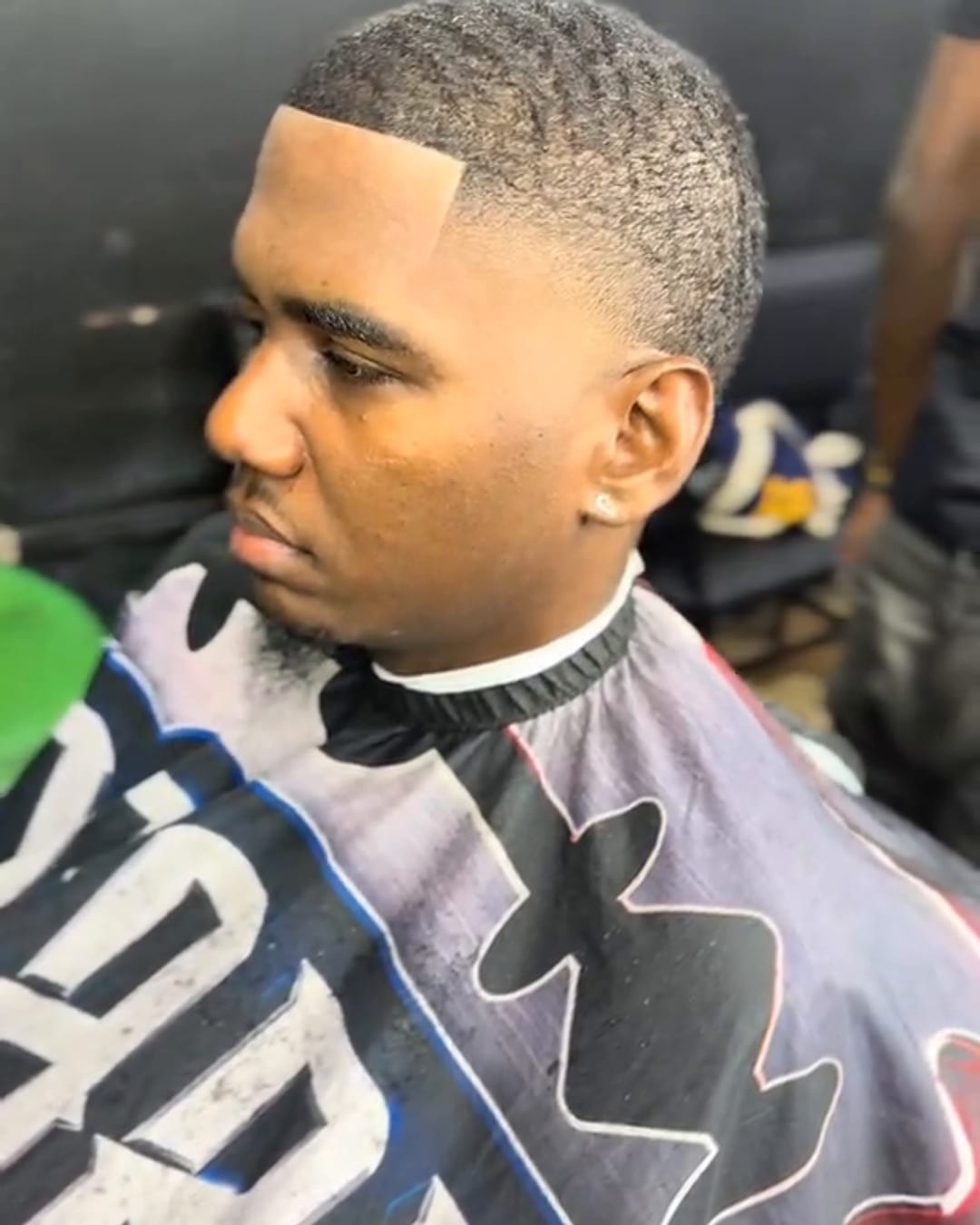 Taper fade with waves by Military Cutz
