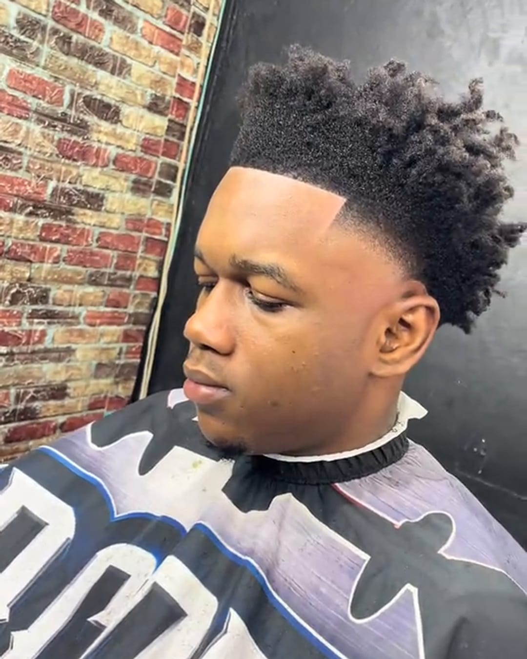 Burst fade with twists by Military Cutz