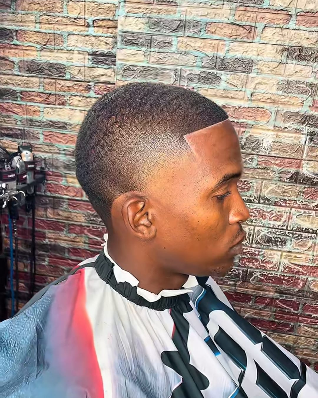 Mid fade with a crisp lineup by Military Cutz